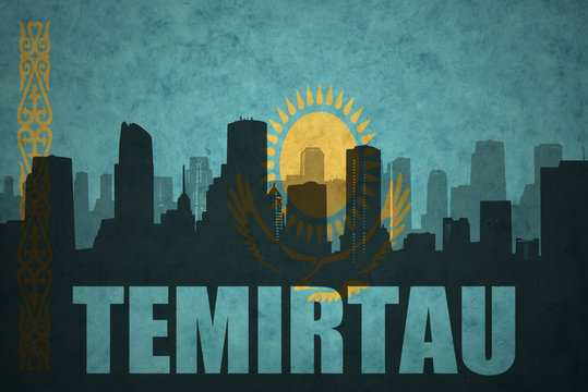 abstract silhouette of the city with text Temirtau at the vintage kazakhstan flag
