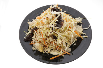Chinese food. Hot salad with cabbage and vegetables