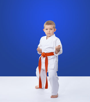 Sportsman stands in the rack of karate