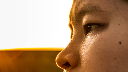 Young sports woman's face sweating from exercise