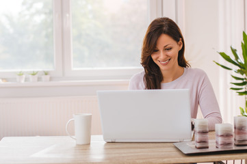 Businesswoman entrepreneur working on laptop from home office sp