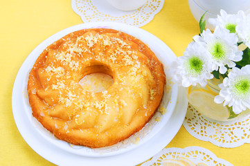 Yellow summer table setting for lemon bundt cake