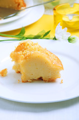 Yellow summer table setting with lemon bundt cake