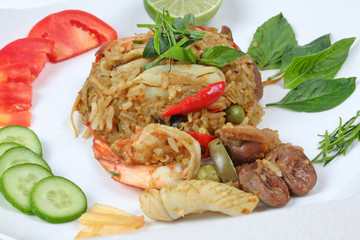 Closeup,Fried jasmine rice in green curry with mixed meat.