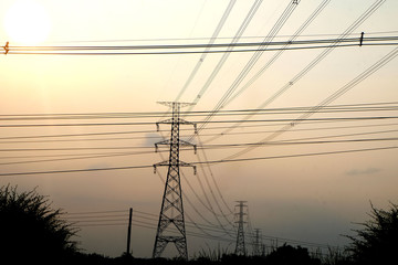 Silhouette of electricity post in thailand