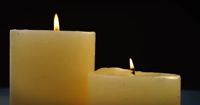 Close-up of candles with flame