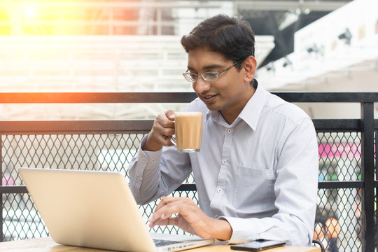 Indian Business Man Having Milk Tea