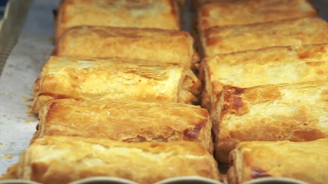 tray of stuffed puff pastry at bakery