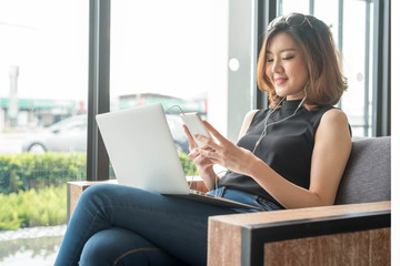Smart woman using smart phone and laptop, Social media life styl