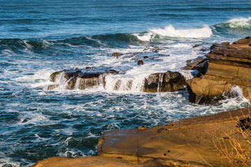 Waves and rock formations at Sunset Cliffs in San Diego, California.  