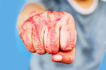 Bloody theme lone murderer: the murderer shows bloody hands and