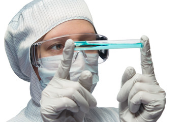 scientist conducting experiments with blue liquid in the flask