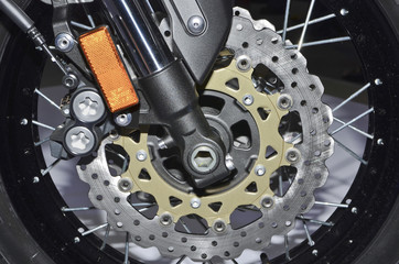 Close up motorcycle disc brake.