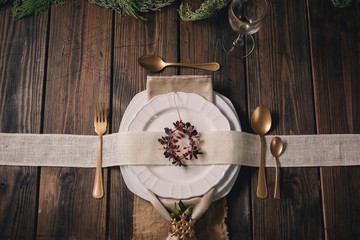 Table Christmas setting with luxurious cutlery