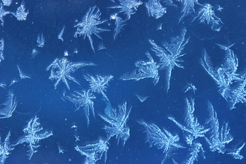 Текстура снежинок на синем фоне, фон. - obrazy, fototapety, plakaty