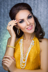 Fototapeta premium Beautiful face of a glamour woman with smoky eyes make-up. Beauty portrait young girl.