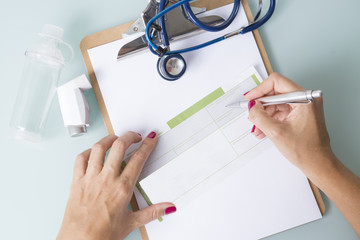 Doctor writing a medical recipe