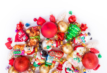 Christmas or New Year background: colored glass balls and toys, decoration on a white background