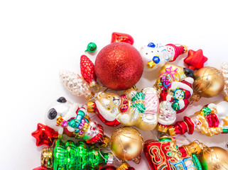 Fototapeta na wymiar Christmas or New Year background: colored glass balls and toys, decoration on a white background