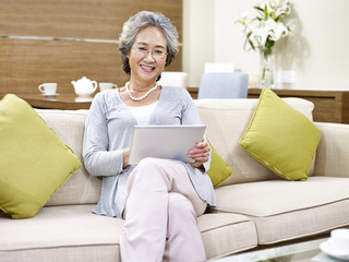 senior asian woman relaxing at home