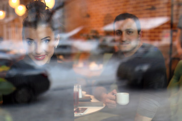 young couple meets in a cafe on a date