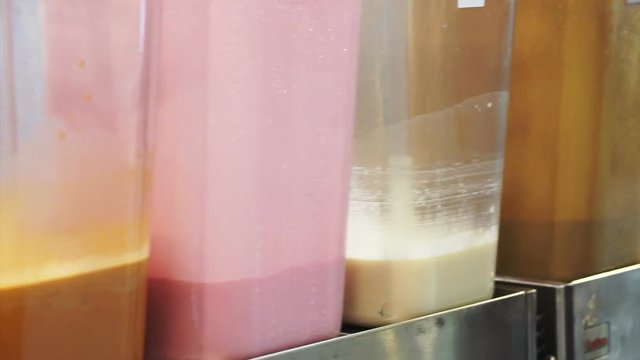 Beverage tank, orange Thai milk tea, pink sweet milk, sweeten milk and chocolate drinks