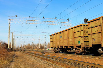 Fototapeta na wymiar View on the railroad track and cargo trains 
