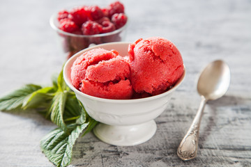 raspberry ice cream with berries, selective focus