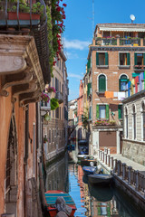 Fototapeta na wymiar scenic canal with colorful ancient houses, Venice, Italy