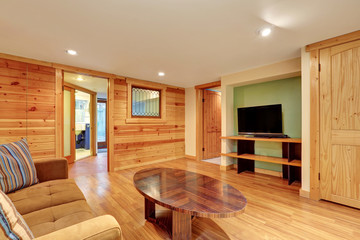 Family room interior with wood paneling