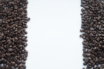 coffee beans on white background. subject soft focus