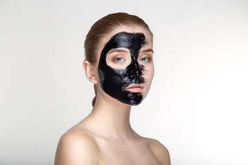 Beauty portrait woman skin care health black mask white background close up