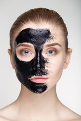 Beauty portrait woman skin care health black mask white background close up