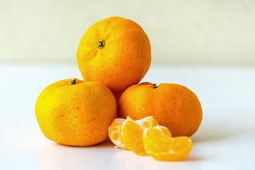 The orange on the white background wallpaper isolated.