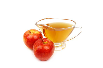 Apple cider vinegar on white background