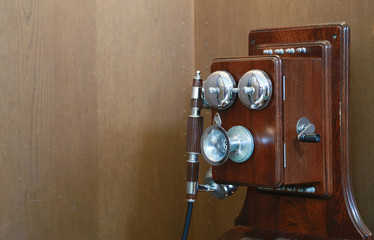 Fototapeta na wymiar Old wooden telephone