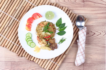 Fried jasmine rice in green curry with mixed meat.