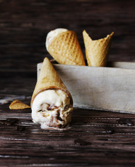 chocolate ice cream in a sugar waffle cones, selective focus