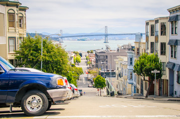 Fototapeta premium Blue Ford stands on the street of San Francisco
