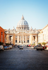 view of street and St. Peter's cathedral in Rome at day, Italy, retro toned