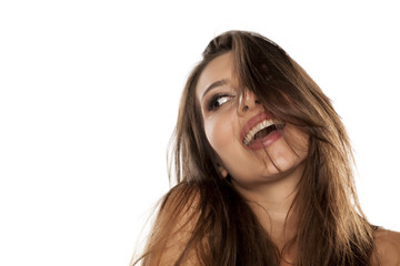 Young happy woman on a white background