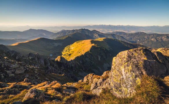 Evening Mountain Landscape with Rocks in Foreground. View from Mount Dumbier in Low Tatras National Park, Slovakia.