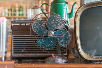 Dirty old vintage metal fan in retro style

