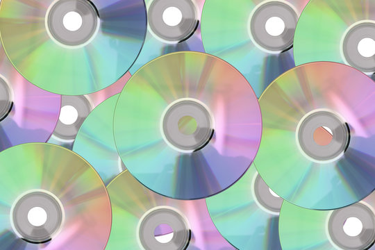 many plate CD, DVD disc at background