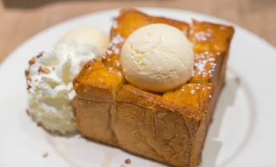 Honey toast with ice cream .