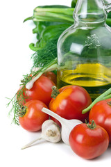 vegetables and a bottle of oil, still life