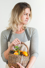 Woman Pastel Hand Hold Basket Tangerines Pine Cone