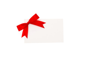 Card with red ribbons bows .