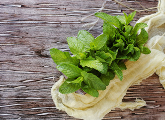 Fresh lemon balm or mint in a small wooden box