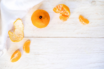 Whole and peeled tangerines